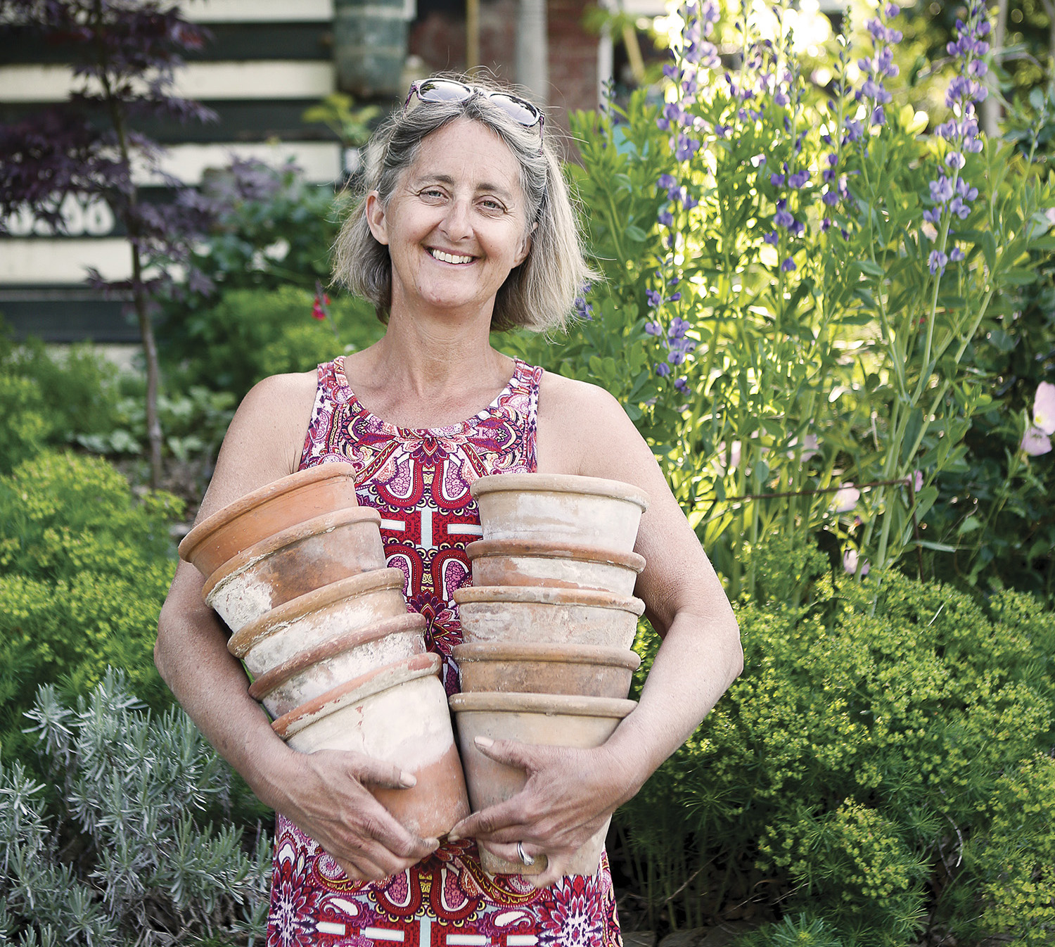 Kate Fisher’s hundreds of gardening pots come from as far away as France. Photo by Matt Rose