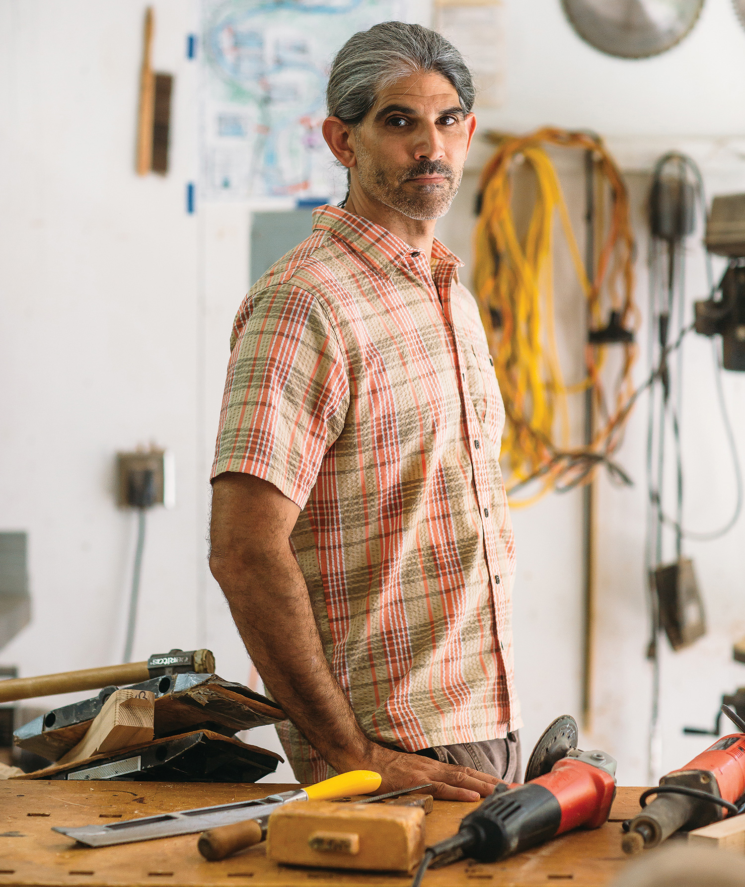“I learned by doing,” says furniture maker Brian Fireman, whose pieces now fetch up to five digits. Photo by Tim Robison