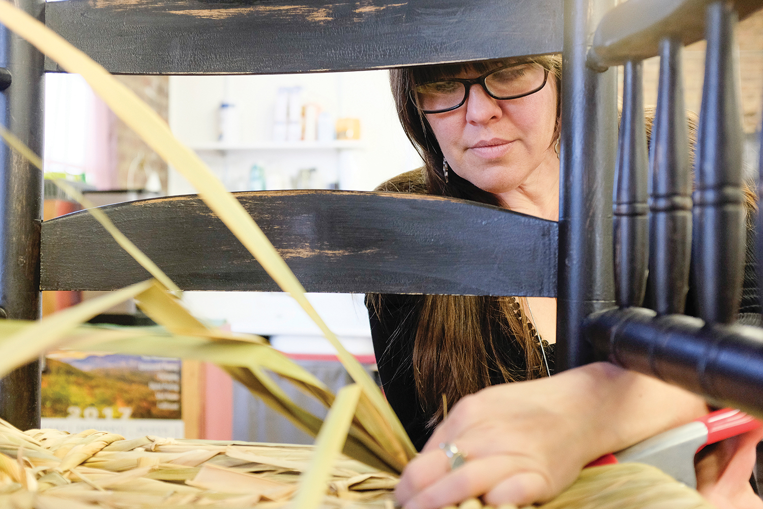 “Chair caning can’t be learned in an hour, as HGTV might lead you to believe,” warns Brandy Clements. Photo by Matt Rose