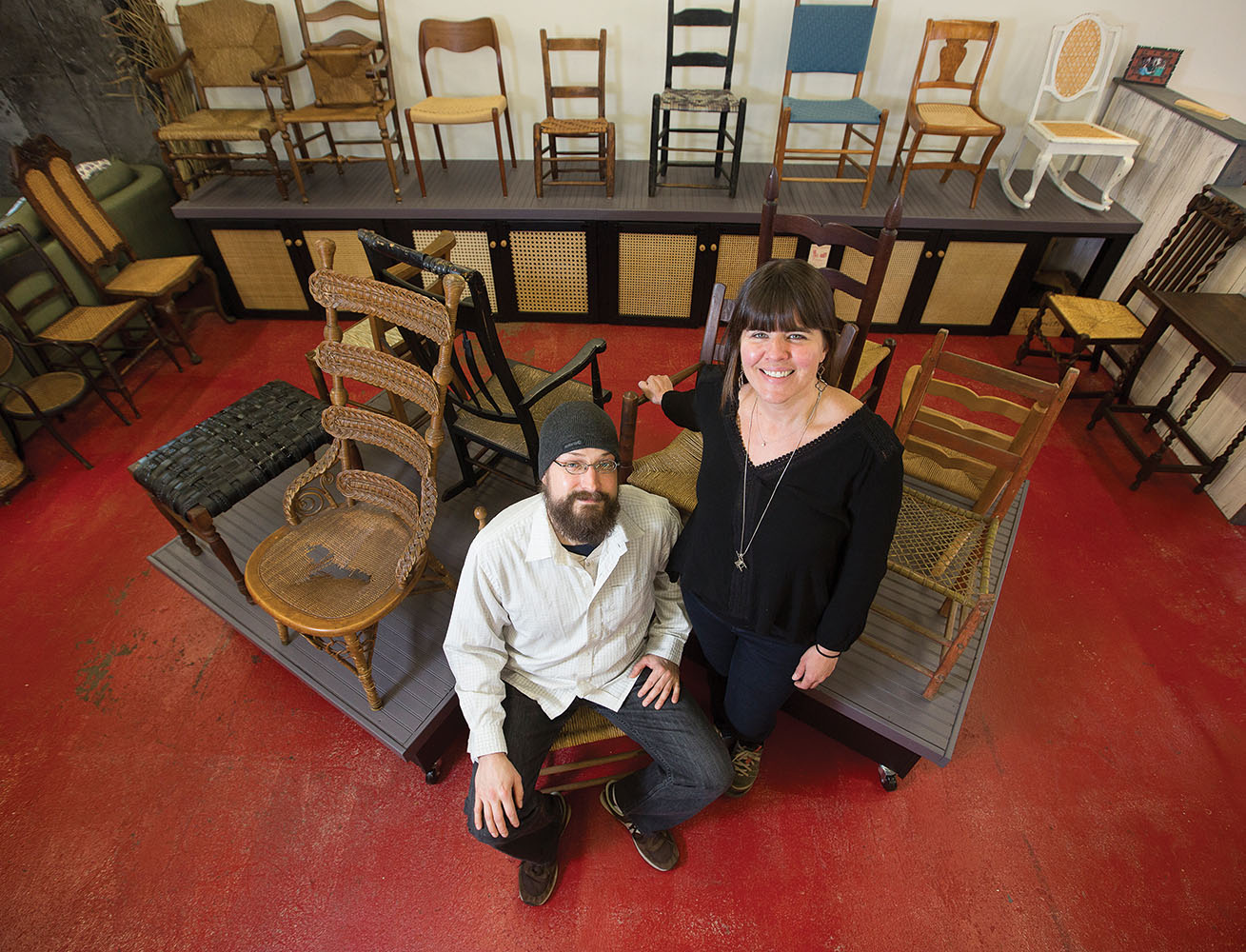 Brandy Clements and Dave Klingler confidently call themselves “chair nerds.” Their Silver River Center for Chair Caning is the only facility of its kind in North America.. Photo by Matt Rose